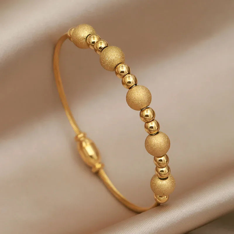 Armbånd i Rustfritt Stål - Kors og Sommerfugl